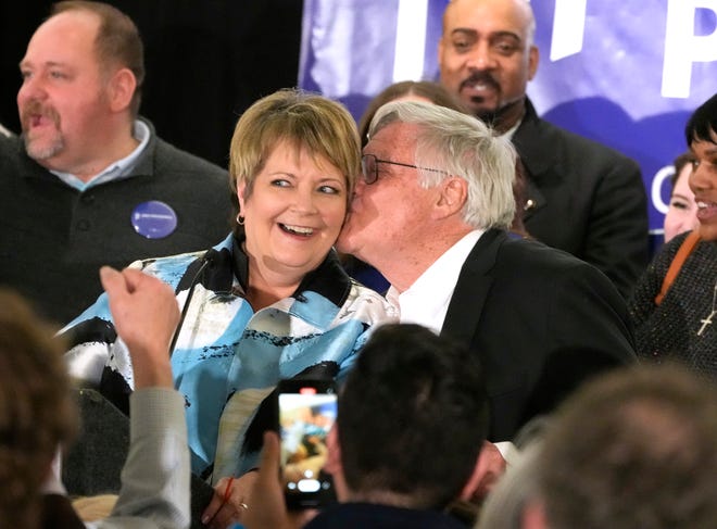 Supreme Court candidate Janet Protasiewicz gets a kiss from her husband Greg Sell while speaking at her election night watch party for state Supreme Court at Saint Kate - The Arts Hotel in Milwaukee  on Tuesday, April 4, 2023. Wisconsin voters headed to the polls for the spring general election to determine a new justice on the Supreme Court as well as other local, nonpartisan offices. Protasiewicz is facing off against Daniel Kelly for a spot on Wisconsin's top court.