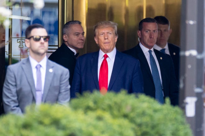 Former President Donald Trump leaves Trump Tower for court in New York City on April 4, 2023.