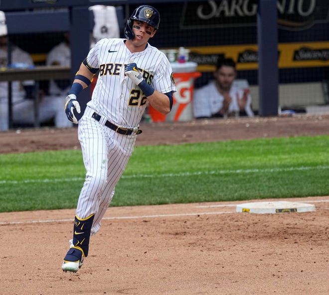 Milwaukee Brewers left fielder Christian Yelich (22) watches his solo home run off St. Louis Cardinals starting pitcher Andre Pallante during the seventh inning of their game against Sunday, April 9, 2023 at American Family Field in Milwaukee, Wis.



Mark Hoffman/Milwaukee Journal Sentinel