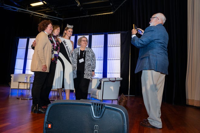 Miss America Grace Stanke poses with other attendees of the Canadian Conference on Waste Management, Decommissioning and Environmental Restoration in Canada in August.