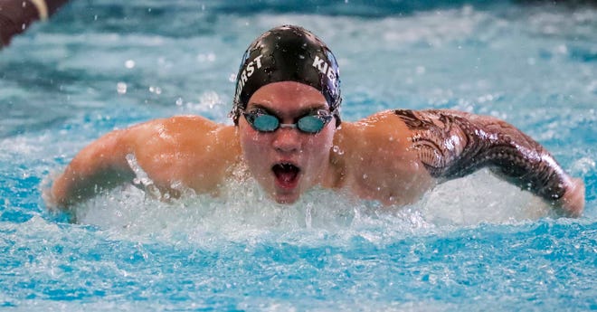 Two Rivers/Roncalli’s Connor Ashenbrenner swims the 100-yard butterfly at the 2024 EWC Championship Swim Meet, Saturday, February 3, 2024, in Kiel, Wis.