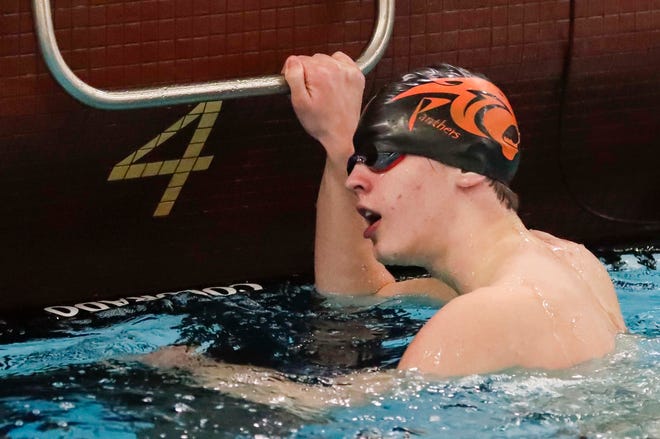 Plymouth High School’s Colton Lindman reacts to finishing the 100-yard freestyle at the 2024 EWC Championship Swim Meet, Saturday, February 3, 2024, in Kiel, Wis.