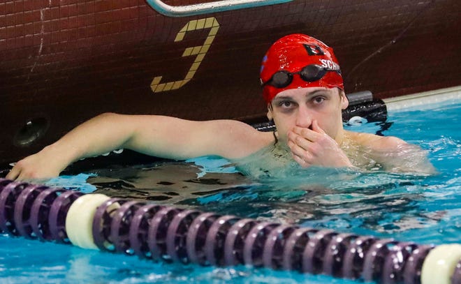 Brillion/Valders/Chilton’s Timber Schuler looks at his time in the 200-yard freestyle at the 2024 EWC Championship Swim Meet, Saturday, February 3, 2024, in Kiel, Wis.
