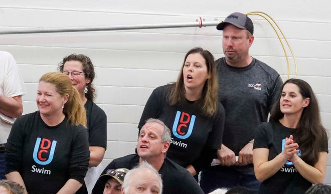 Green Bay United fans cheer and watch their swimmers at the 2024 EWC Championship Swim Meet, Saturday, February 3, 2024, in Kiel, Wis.