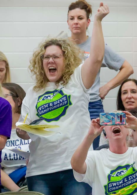 Laura Madson cheers on Daniel Madson in the 200-yard Medley at the 2024 EWC Championship Swim Meet, Saturday, February 3, 2024, in Kiel, Wis.