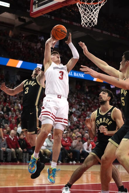 Wisconsin guard Connor Essegian (3) scores during the second half of their game Sunday, February 4, 2024 at the Kohl Center in Madison, Wisconsin. Purdue beat Wisconsin 75-69.