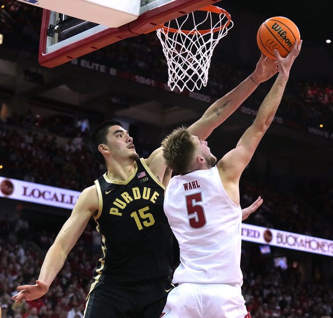 Purdue center Zach Edey (15) blocks a shot by Wisconsin forward Tyler Wahl (5) during the second half of their game Sunday, February 4, 2024 at the Kohl Center in Madison, Wisconsin. Purdue beat Wisconsin 75-69.