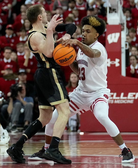 Wisconsin guard Chucky Hepburn (23) steals the ball from Purdue guard Braden Smith (3) during the second half of their game Sunday, February 4, 2024 at the Kohl Center in Madison, Wisconsin. Purdue beat Wisconsin 75-69.