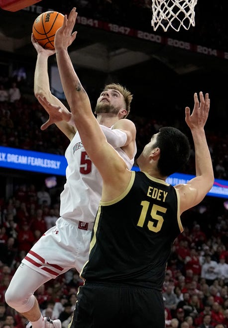 Wisconsin forward Tyler Wahl (5) shoot over Purdue center Zach Edey (15) during the second half of their game Sunday, February 4, 2024 at the Kohl Center in Madison, Wisconsin. Purdue beat Wisconsin 75-69.