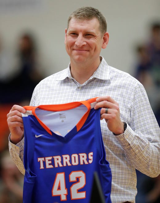 Appleton West great Brian Butch has his No. 42 jersey retired by the school prior to the basketball game against Kaukauna Friday, February 2, 2024, in Appleton, Wisconsin. Butch was a two-time Associated Press state player of the year, the 2003 Wisconsin Mr. Basketball winner and a McDonald's All-American during his final season with the Terrors.