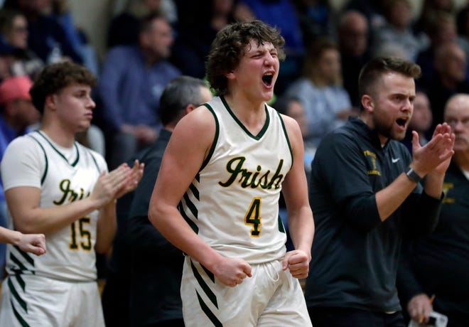 Freedom High School's Kaden Vandenberg (4) cheers for his team as they take they a four point lead against Little Chute High School late in the game during their boys basketball game Thursday, February 1, 2024, in Freedom, Wisconsin. Freedom won 54-47.