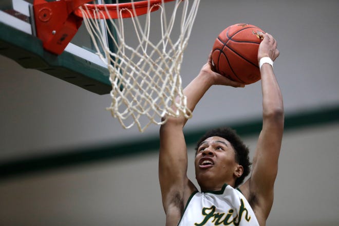 Freedom High School's Donovan Davis (24) goes for a dunk against Little Chute High School during their boys basketball game Thursday, February 1, 2024, in Freedom, Wisconsin. Freedom won 54-47.