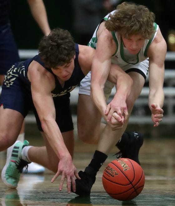 Appleton North High School's Will Guilbeault (20) against Oshkosh North High School's Steven Clark (0) during their boys basketball game on Tuesday, January 30, 2024 in Oshkosh, Wis. Oshkosh North defeated Appleton North 83-69.
Wm. Glasheen USA TODAY NETWORK-Wisconsin
