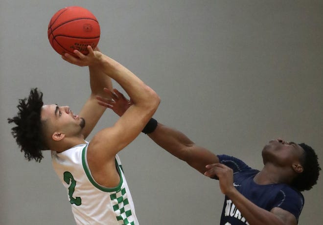 Oshkosh North High School's Xzayvion Mitchell (2) against Appleton North High School's Abraham Tomori (23) during their boys basketball game on Tuesday, January 30, 2024 in Oshkosh, Wis. Oshkosh North defeated Appleton North 83-69.
Wm. Glasheen USA TODAY NETWORK-Wisconsin