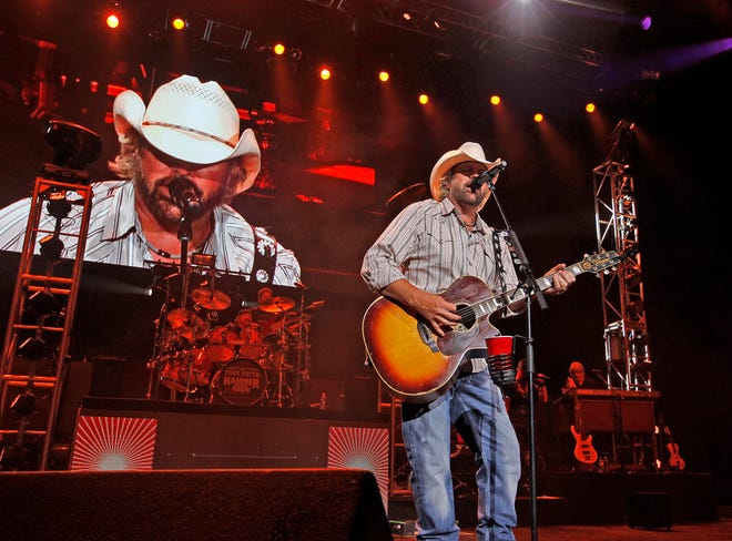 Country star Toby Keith performs at the opening night of the 2013 Harley-Davidson homecoming festival at the Marcus Amphitheater on the Summerfest grounds on Aug. 29, 2013. Keith died of cancer on Feb. 5, 2024, at age 62.