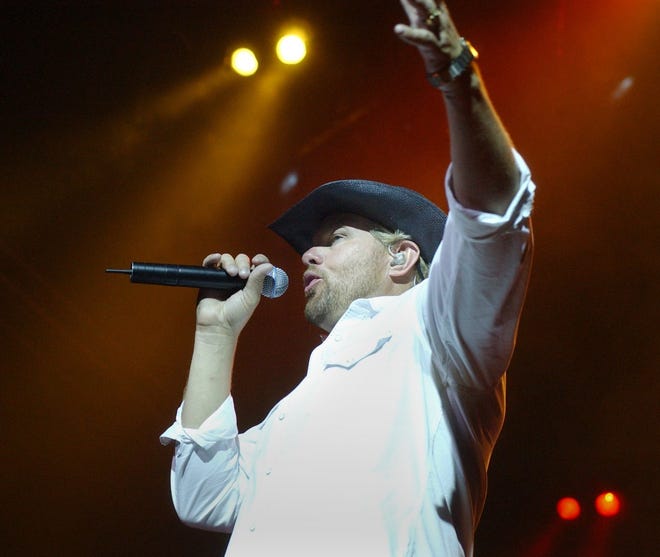 Toby Keith performs at the Marcus Amphitheater on the Summerfest grounds on July 2, 2003.