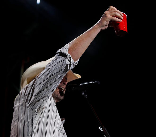 Country star Toby Keith toasts the Harley faithful, referencing his hit "Red Solo Cup," as he headlines the opening night of the Harley-Davidson homecoming festival at the Marcus Amphitheater on Aug. 29, 2013.