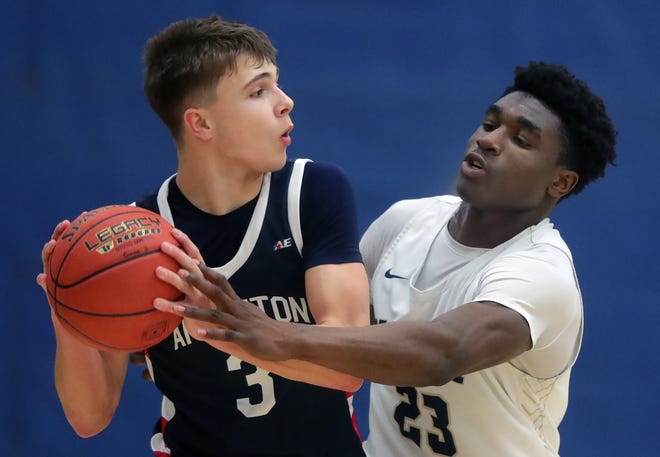 Appleton North High School's Abraham Tomori (23) against Appleton East High School's Cade Prestigiacomo (3) during their boys basketball game on Tuesday, February 6, 2024 at Appleton North High School in Appleton, Wis. East defeated North 58-44.
Wm. Glasheen USA TODAY NETWORK-Wisconsin