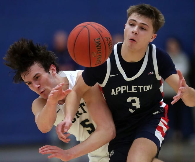 Appleton North High School's Grant Hardy (5) against Appleton East High School's Cade Prestigiacomo (3) during their boys basketball game on Tuesday, February 6, 2024 at Appleton North High School in Appleton, Wis. East defeated North 58-44.
Wm. Glasheen USA TODAY NETWORK-Wisconsin