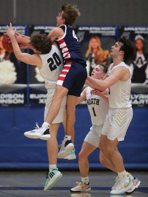 Appleton North High School's Will Guilbeault (20) against Appleton East High School's Brayden Nieman (4) during their boys basketball game on Tuesday, February 6, 2024 at Appleton North High School in Appleton, Wis. East defeated North 58-44.
Wm. Glasheen USA TODAY NETWORK-Wisconsin