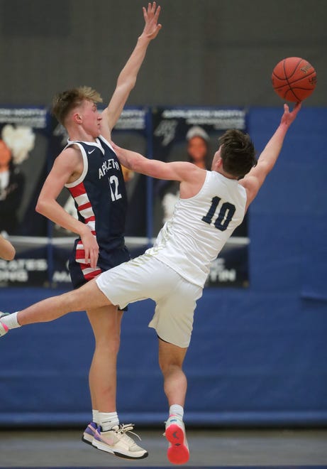 Appleton North High School's Sean Hansen (10) against Appleton East High School's Jacob Weisbach (12) during their boys basketball game on Tuesday, February 6, 2024 at Appleton North High School in Appleton, Wis. East defeated North 58-44.
Wm. Glasheen USA TODAY NETWORK-Wisconsin