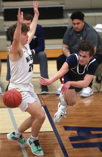 Appleton North High School's Will Guilbeault (20) against Appleton East High School's Joey LaChapell (2) during their boys basketball game on Tuesday, February 6, 2024 at Appleton North High School in Appleton, Wis. East defeated North 58-44.
Wm. Glasheen USA TODAY NETWORK-Wisconsin