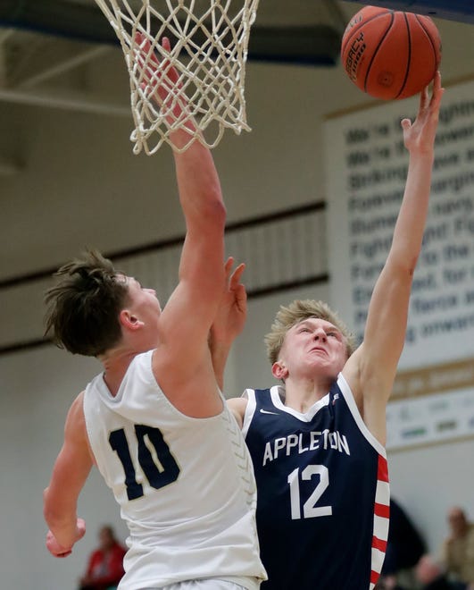 Appleton East High School's Jacob Weisbach (12) against Appleton North High School's Sean Hansen (10) during their boys basketball game on Tuesday, February 6, 2024 at Appleton North High School in Appleton, Wis. East defeated North 58-44.
Wm. Glasheen USA TODAY NETWORK-Wisconsin