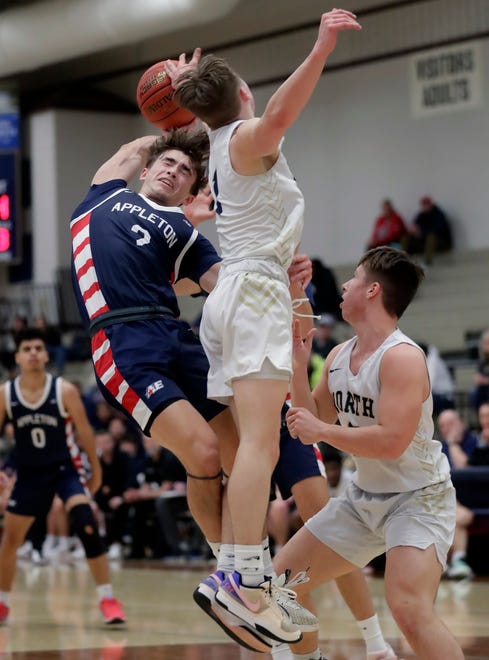 Appleton North High School's Will Sweeney (1) against Appleton East High School's Joey LaChapell (2) during their boys basketball game on Tuesday, February 6, 2024 at Appleton North High School in Appleton, Wis. East defeated North 58-44.
Wm. Glasheen USA TODAY NETWORK-Wisconsin