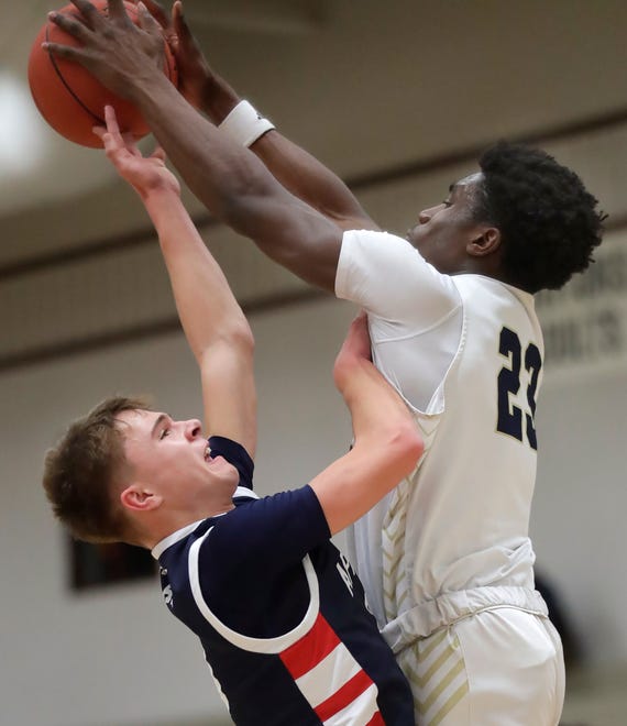 Appleton North High School's Abraham Tomori (23) against Appleton East High School's Cade Prestigiacomo (3) during their boys basketball game on Tuesday, February 6, 2024 at Appleton North High School in Appleton, Wis. East defeated North 58-44.
Wm. Glasheen USA TODAY NETWORK-Wisconsin