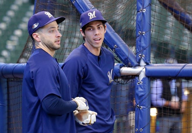 Milwaukee Brewers Ryan Braun (left) and Christian Yelich chat before the Milwaukee Brewers National League Divisional Series game against the Colorado Rockies on Thursday, October 4, 2018.    -  Photo by Mike De Sisti / Milwaukee Journal Sentinel