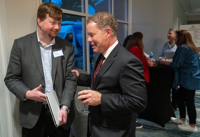 Wisconsin Supreme Court candidate Daniel Kelly, right, speaks with Wisconsin Family Action Randy Melchert at an election night gathering Tuesday, April 4, 2023 at the Heidel House Hotel & Conference Center in Green Lake, Wis. The national implications of the race have drawn unprecedented donations from across the country. Supreme Court seats are officially nonpartisan but candidates run as conservatives or liberals with campaigns that are backed by the state's political parties.