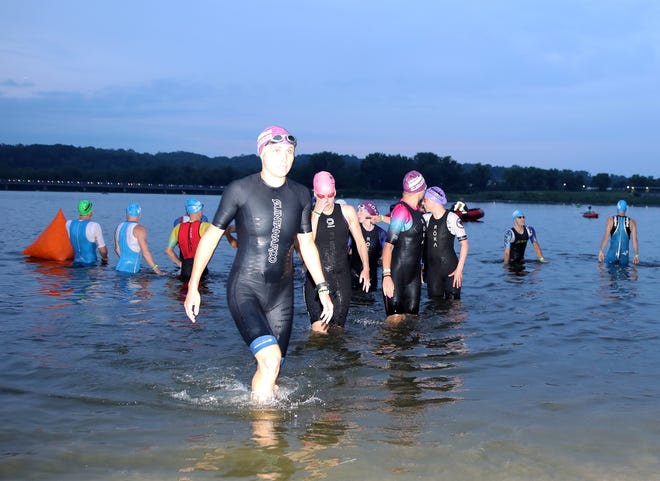 Swimmers test the waters before the Ironman North American Championship 140.6-mile Des Moines Triathlon as athletes compete in a 2.4-mile swim at Gray’s Lake, 112-mile bike race, and a 26.2-mile run in Des Moines on Sunday, June 12, 2022. This regional competition will offer qualifying slots to the 2022 Ironman World Championship in Kailua-Kona, Hawaii in early October 2022.